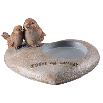 Gravpynt fugler på stein for telys